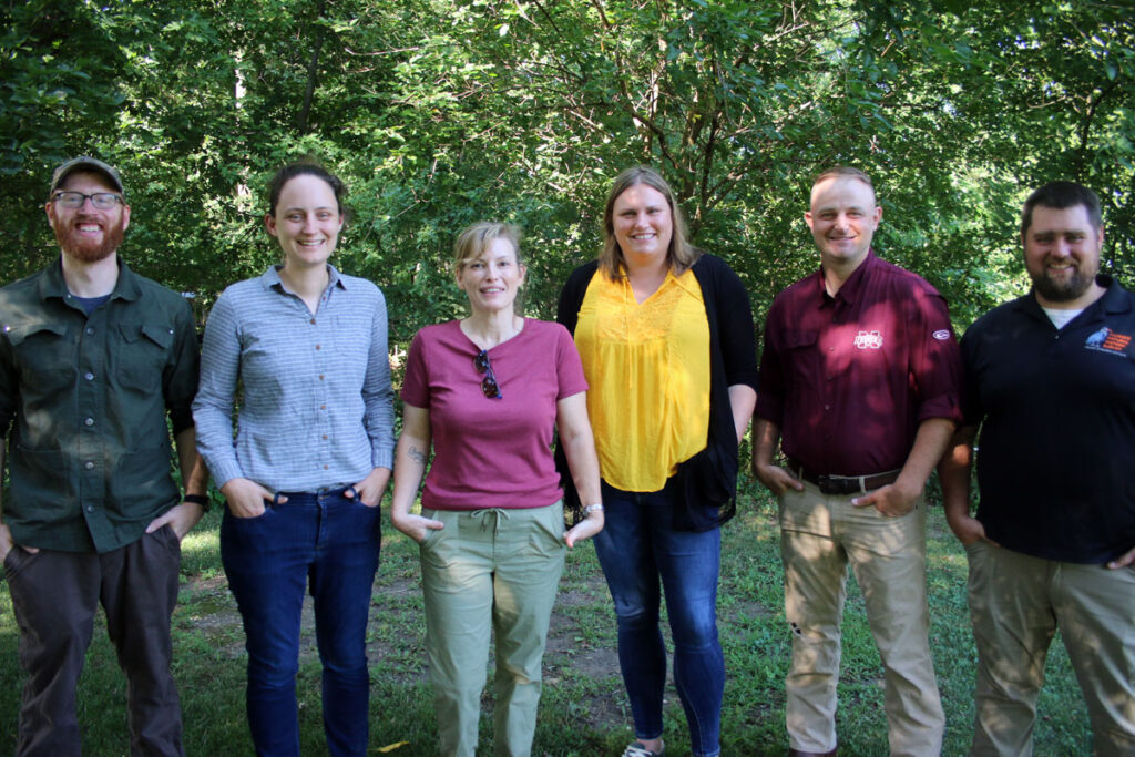 Six staff members, 2022.